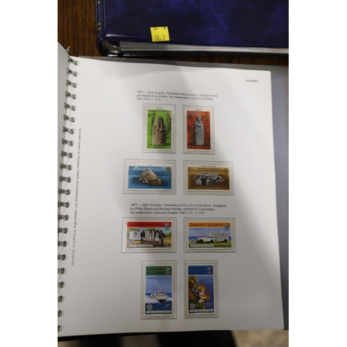 411 - 2 stamp albums, Channel Island & Isle of Man