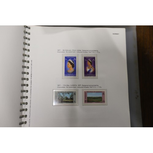 411 - 2 stamp albums, Channel Island & Isle of Man