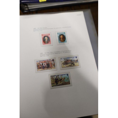 411 - 2 stamp albums, Channel Island & Isle of Man