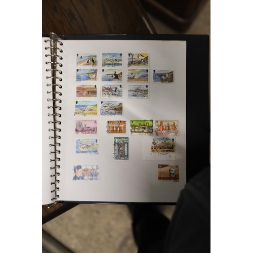 411 - 2 stamp albums, Channel Island & Isle of Man