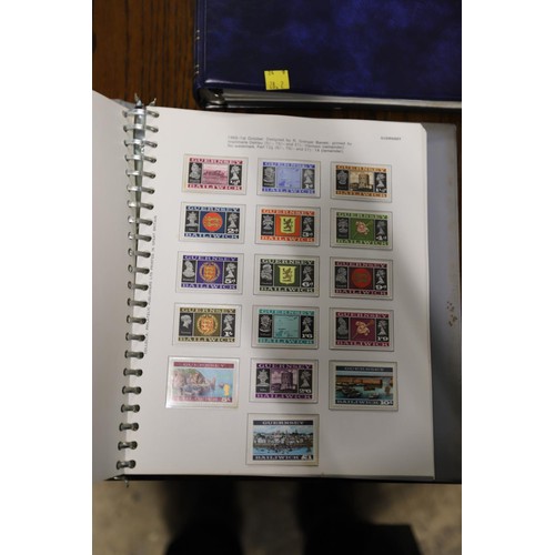 411 - 2 stamp albums, Channel Island & Isle of Man