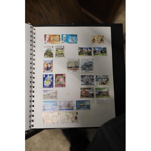 411 - 2 stamp albums, Channel Island & Isle of Man