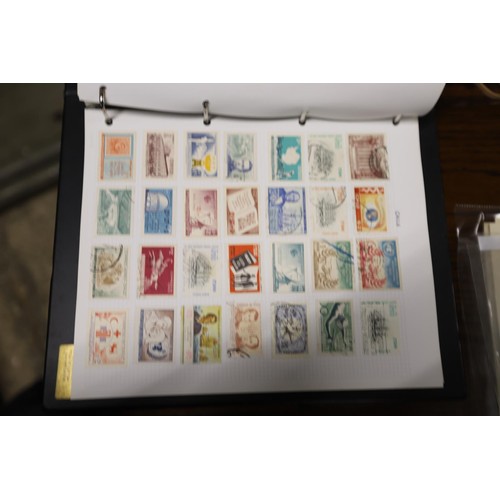 412 - Worldwide stamp collection, 1 album & 4 packs of album pages