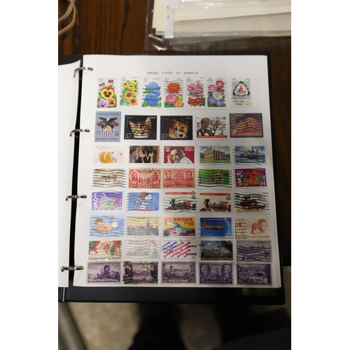 412 - Worldwide stamp collection, 1 album & 4 packs of album pages