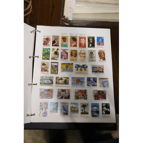 412 - Worldwide stamp collection, 1 album & 4 packs of album pages