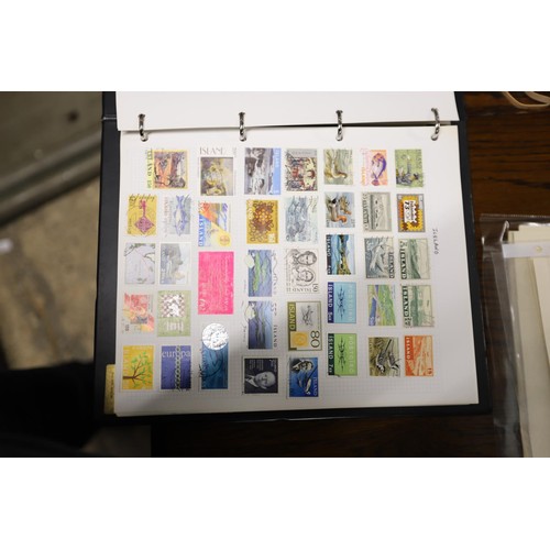 412 - Worldwide stamp collection, 1 album & 4 packs of album pages