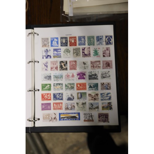 412 - Worldwide stamp collection, 1 album & 4 packs of album pages