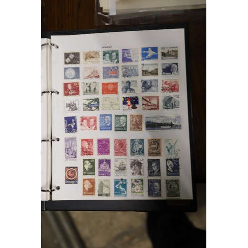 412 - Worldwide stamp collection, 1 album & 4 packs of album pages