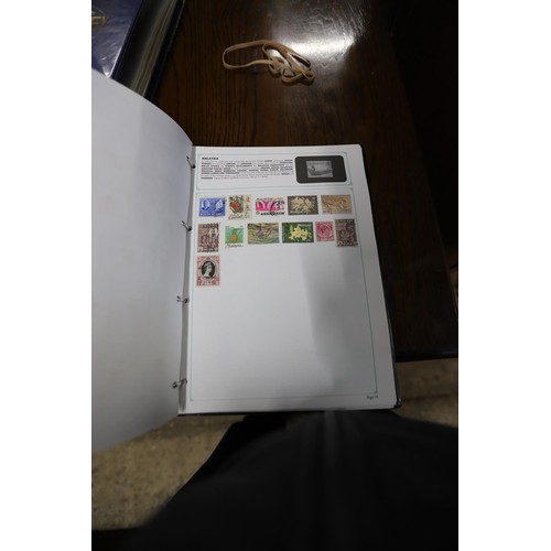 419 - Comprehensive world stamps collection in 2 Stanley Gibbons albums