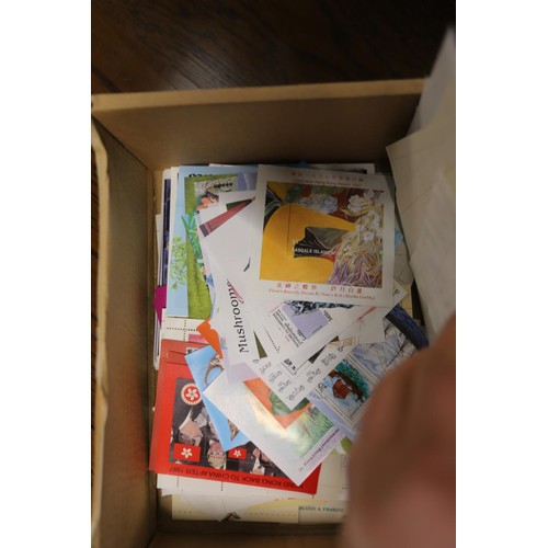 422 - Box of worldwide stamp mini sheets with duplication