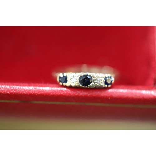 518 - 9ct gold ring with 5 stones - 1.6gms total