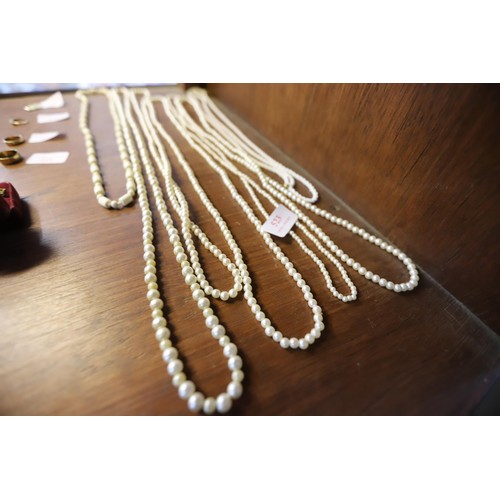 523 - 5 pearl necklaces & 2 others