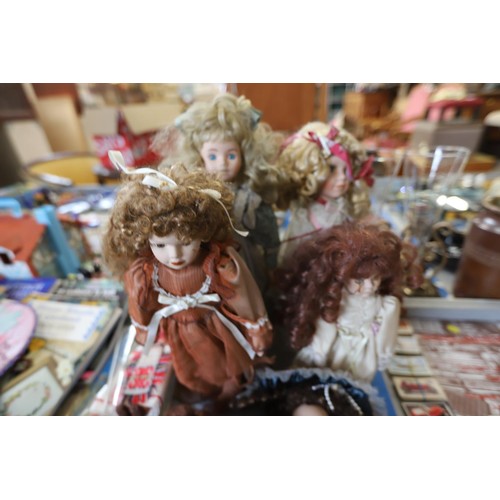 528 - Various porcelain dolls