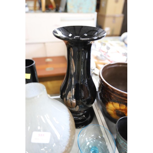 555 - Coloured glassware, incl black/gold vase on a stand, Caithness, Wedgwood