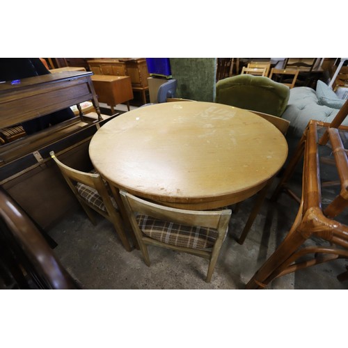 587 - Teak extendable round dining table & chairs