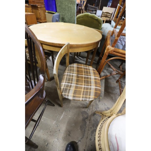 587 - Teak extendable round dining table & chairs