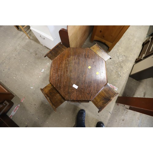 697 - oak hexagonal table with pull out rest