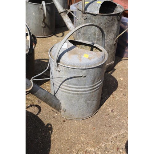 47 - Pair of galvanised watering cans