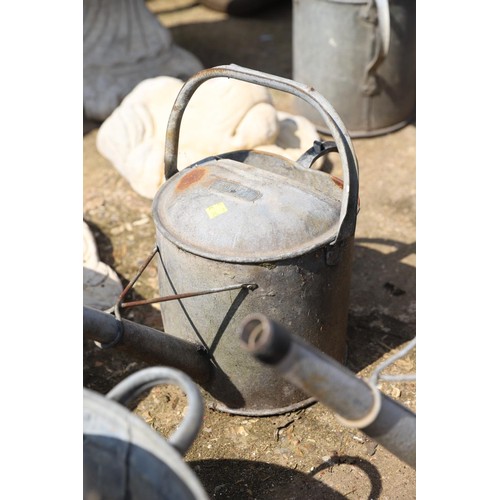 47 - Pair of galvanised watering cans