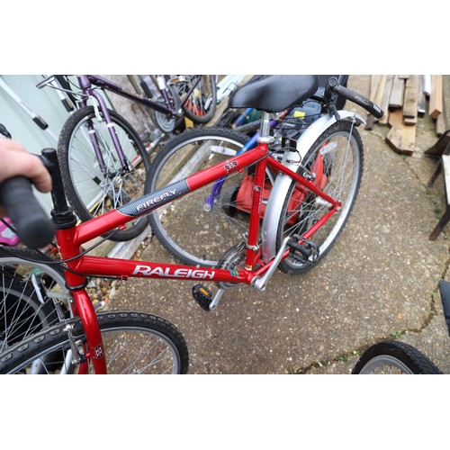 24 - Raleigh red bike