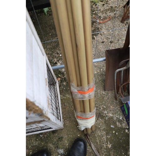 23 - Bundle of broom handles, new