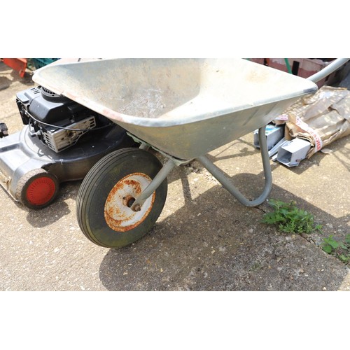 64 - Galvanised solid wheel wheelbarrow