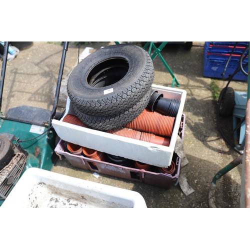 68 - 2 trays of pots/2 barrow tyres