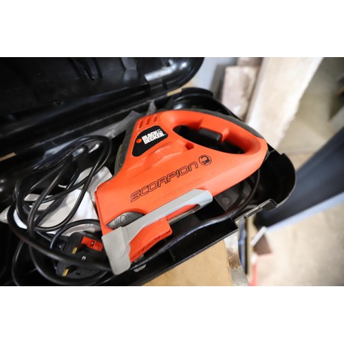 175 - Black & Decker electric saw - warranted until 12 noon Tuesday following the above sale