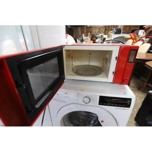 239 - Delonghi microwave - warranted until noon tues following the above sale