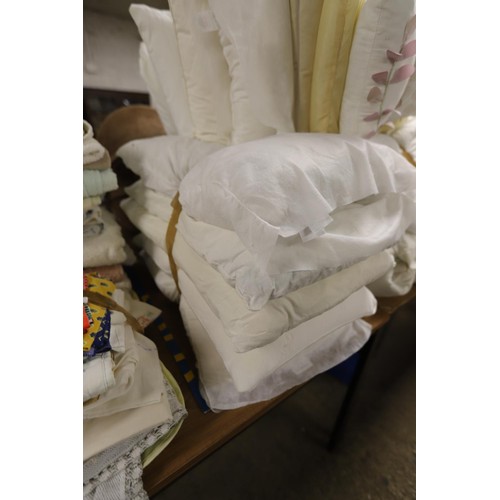 252 - 2 bundles of pillows & bundle of duvets