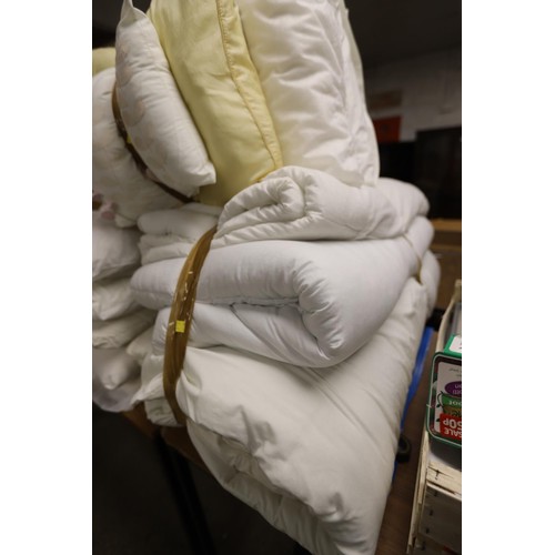 252 - 2 bundles of pillows & bundle of duvets