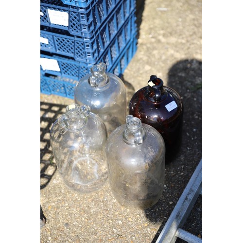 27 - 1 brown & 3 clear demijohn bottles