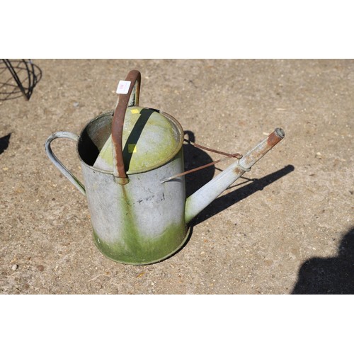 104 - Galvanised watering can