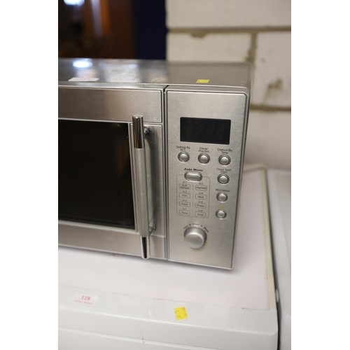 117 - Stainless microwave - warranted until 12 noon Tuesday following the above sale