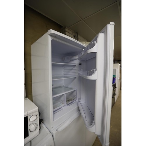 121 - Hotpoint fridge freezer - warranted until 12 noon Tuesday following the above sale