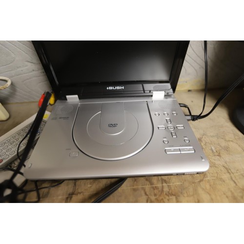 154 - Bush portable DVD player with manual & remote - warranted until 12 noon Tuesday following the above ... 