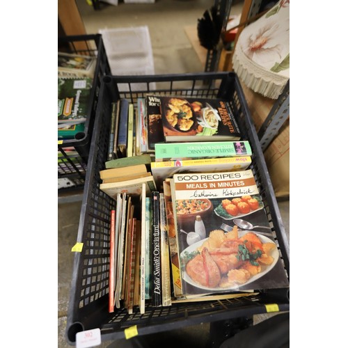 302 - 2 boxes of various cook books, etc