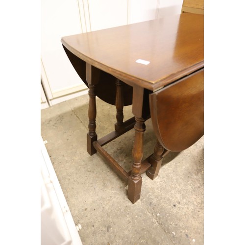 369 - Solid oak drop leaf table