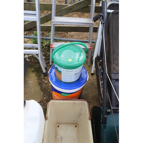 73 - Two plastic 20 L tanks quantity of garden pots etc