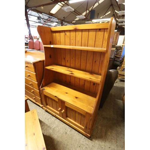 658 - Pine shelves with cupboard on castors