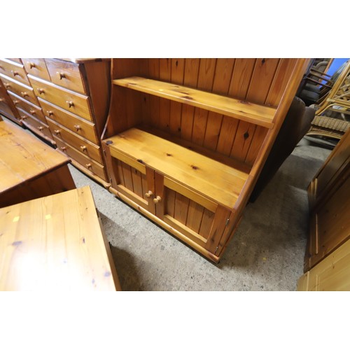 658 - Pine shelves with cupboard on castors