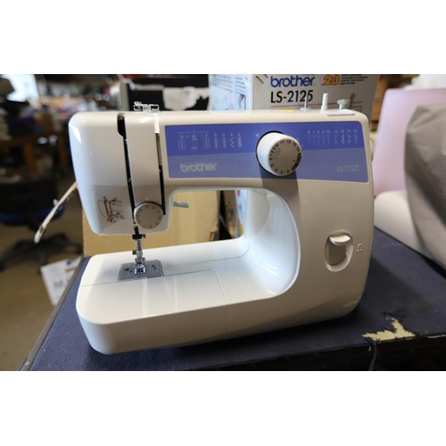 296 - Brother LS-2125 sewing machine with instructions, pedal, etc - warranted until 12 noon Tuesday follo... 