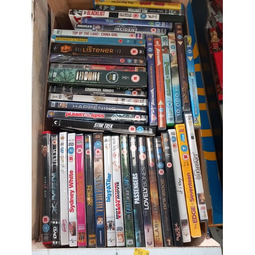 302 - 2 crates of VHS & DVDs