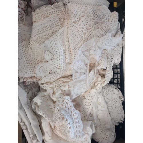 308 - 2 crates of assorted table linen, incl table cloths, lace doilies, etc, net curtains