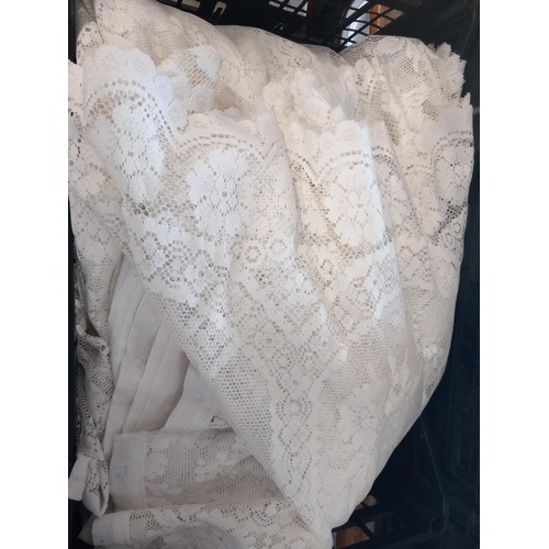 308 - 2 crates of assorted table linen, incl table cloths, lace doilies, etc, net curtains