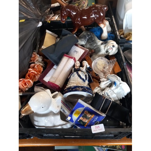 315 - Qty of misc ornaments, various photo frames, tie racks, etc