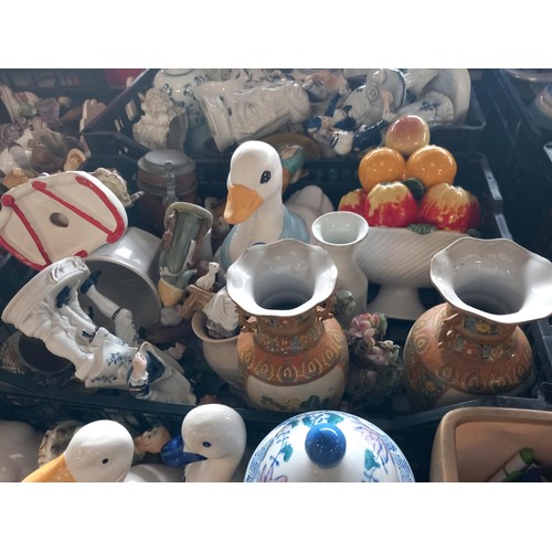 324 - 4 crates of various ornaments, candle holders, vases, posy’s, collection of bells, etc