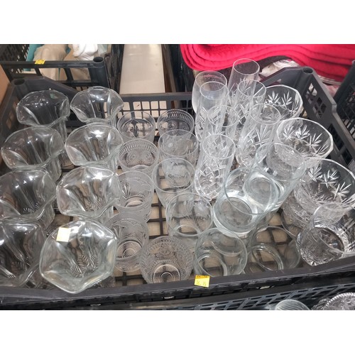 338 - 4 crates of of glassware, various drinking glasses