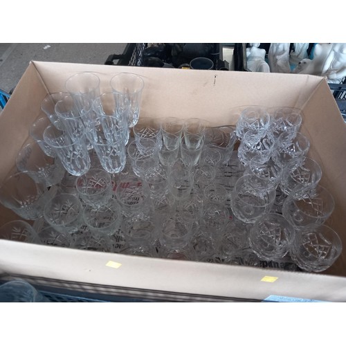 338 - 4 crates of of glassware, various drinking glasses