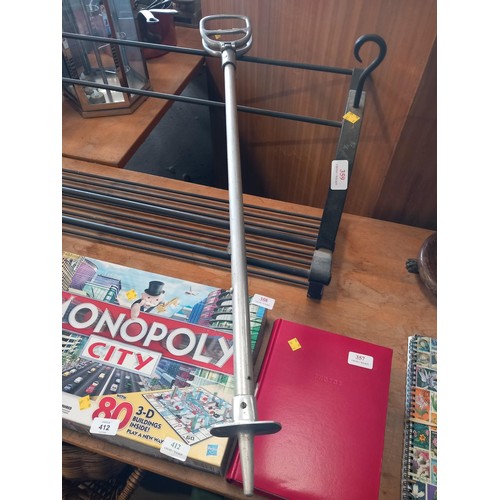 351 - Stick stand with shooting stick, brollies, etc